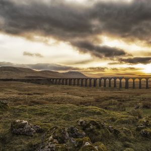 photo looking over ribblehead viaduct towards ingleborough