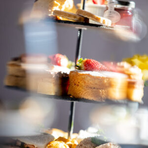 photo looking through a wine glass during afternoon tea